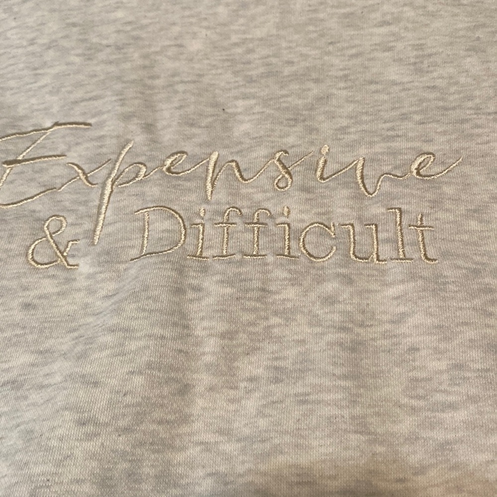 cream colored oversized sweatshirt
